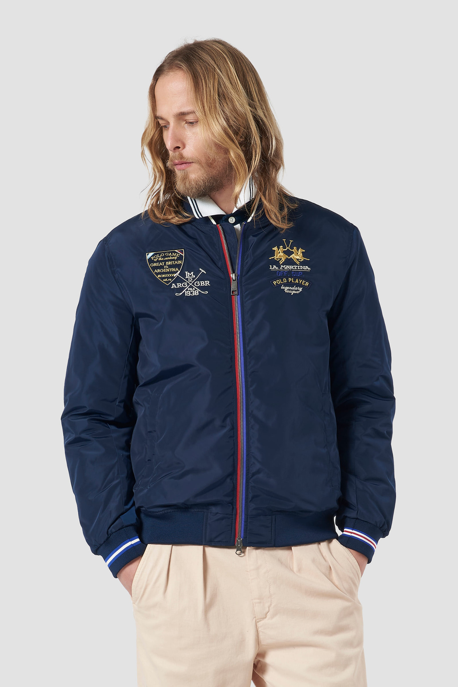 Patch-embellished bomber jacket