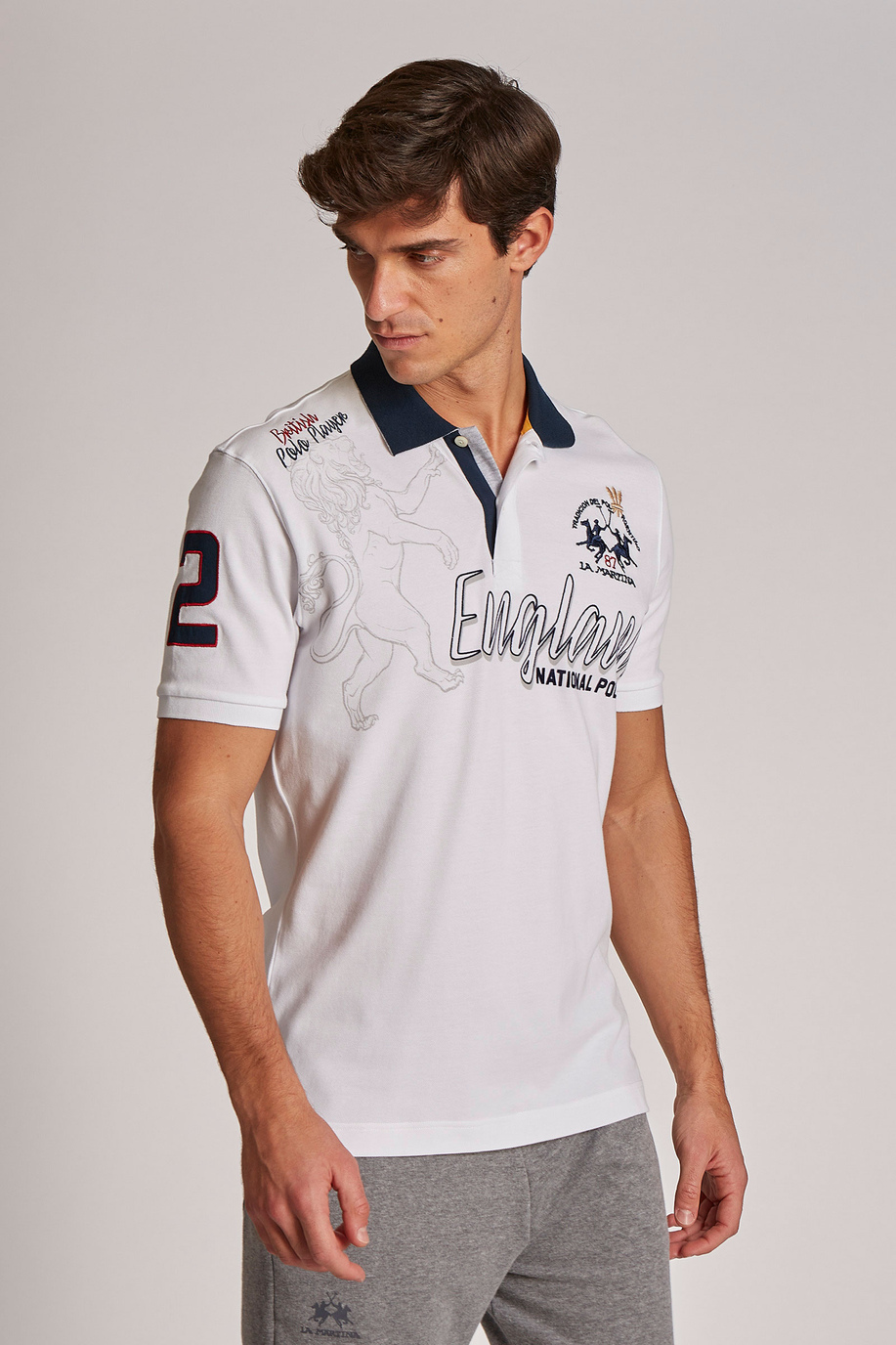 Herren-Poloshirt aus Stretch-Baumwolle mit kurzen Ärmeln im Regular Fit - SALE | La Martina - Official Online Shop