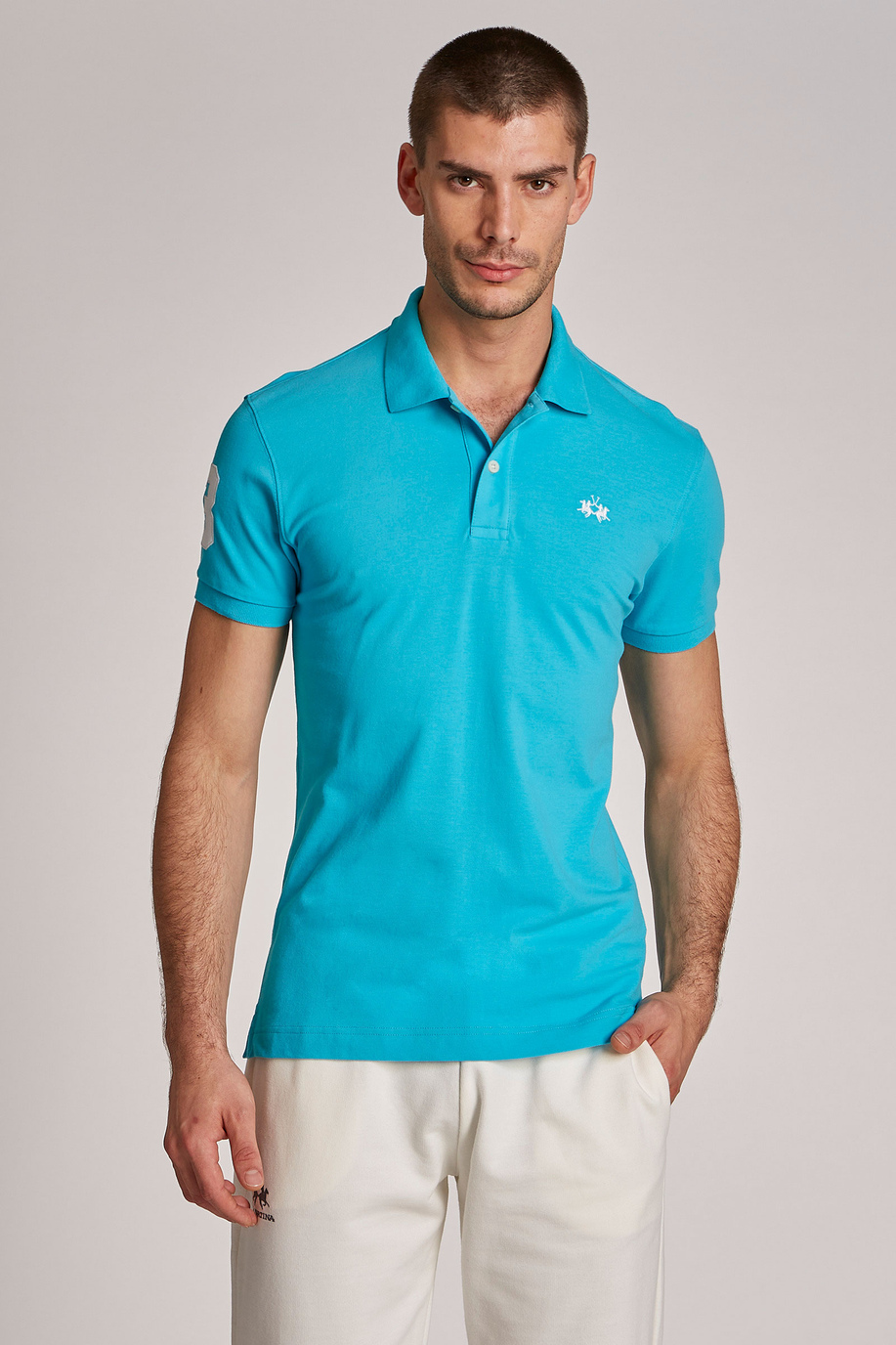 Herren-Poloshirt aus Stretch-Baumwolle mit kurzen Ärmeln im Slim Fit - -30% | archive | La Martina - Official Online Shop