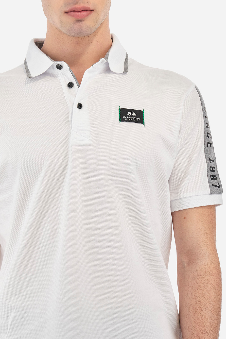 Men's short-sleeved polo shirt Logos maxi stylized logo in solid color - Velyo - Polo Shirts | La Martina - Official Online Shop